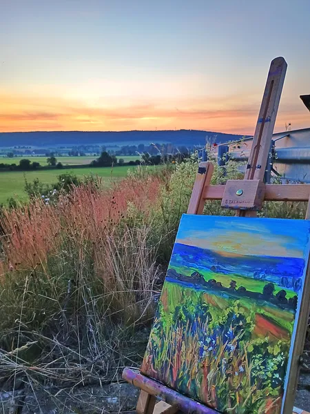 Image of Blick auf Teutschbuch bei Sonnenuntergang by Karina Semenyuk, size: 25 x 30, made of Oil on canvas, Paintings medium, from Riedlingen, Germany, part of the Summer 2025 series, priced at €90